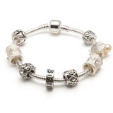 cream sister bracelet with charms and beads